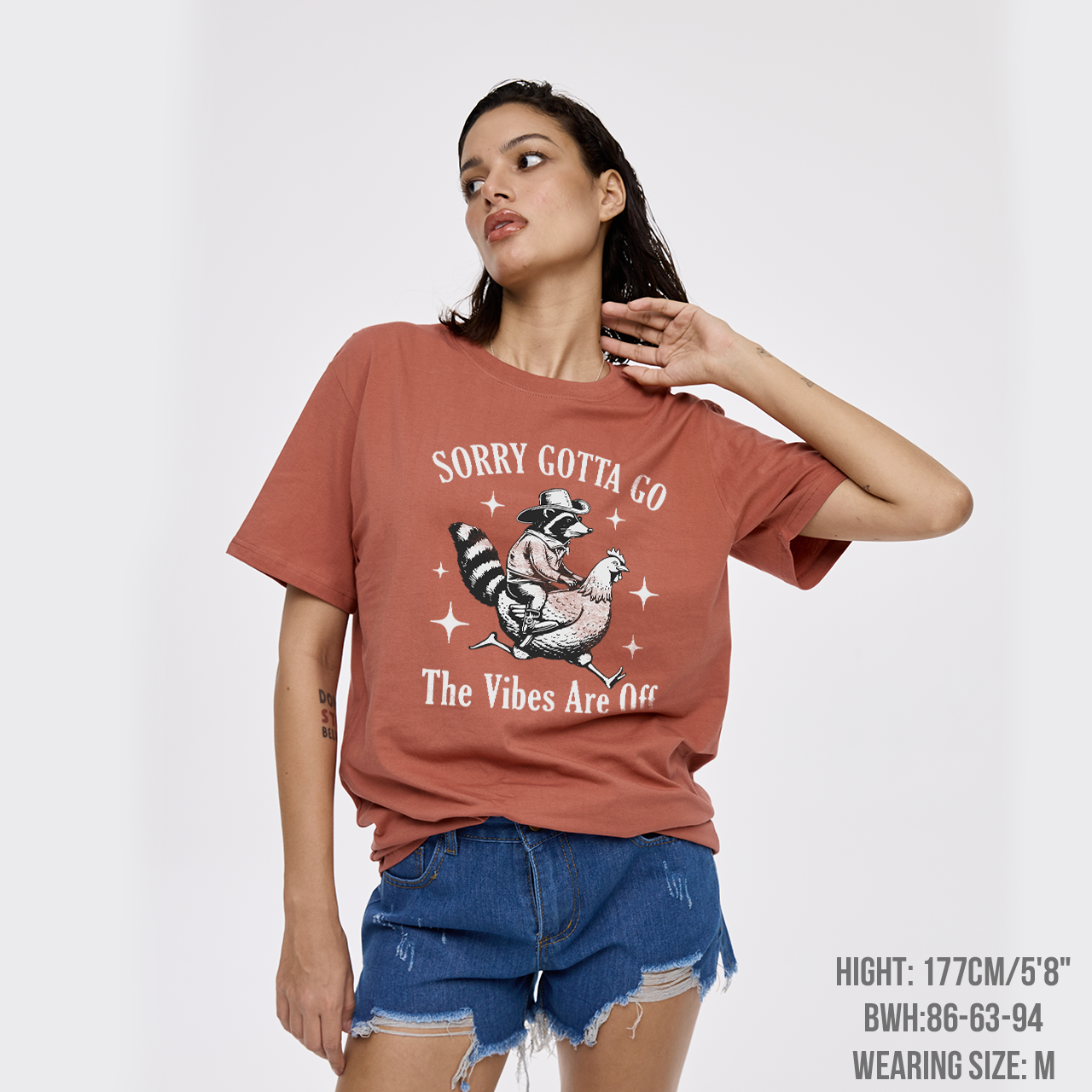 Cowboy Raccon Riding A Chicken T-Shirts