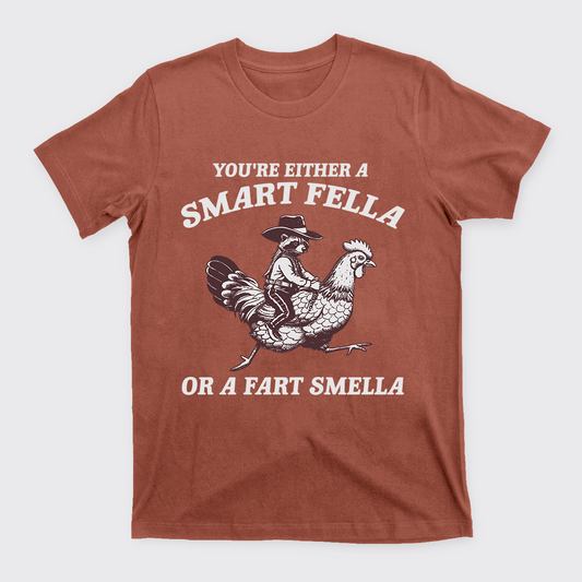 The Raccoon Rides The Chicken T-Shirts